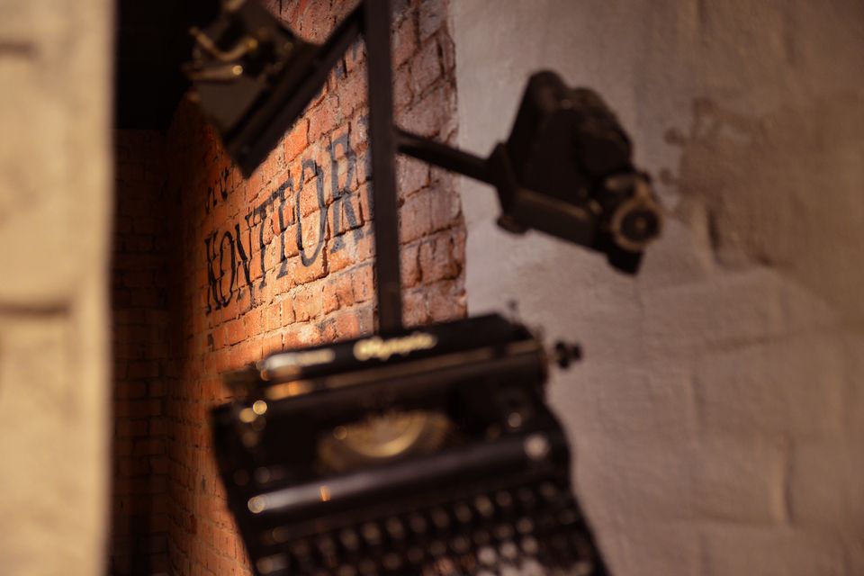 Interior design details of Olutravintola Konttori playfully reference its office-themed concept, with a vintage typewriter highlighting the pub's unique aesthetic (Photo: Ronja Honko) (Photo: Ronja Honko)