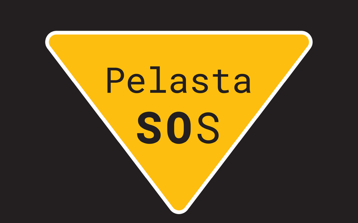 Keltainen kolmion muotoinen kyltti, jossa lukee "Pelasta SOS".