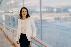 Pia Santavirta, a dark-haired woman and Tesi's (officially Finnish Industry Investment) CEO, pictured in Central Library Oodi