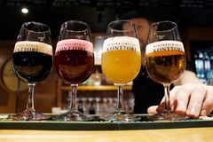 beer tasting glasses on a wooden desk