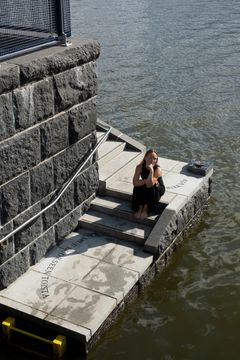 The artist Heini Aho and a detail of her work Washed Ashore by a Thought, 2024. Photo: HAM / Sonja Hyytiäinen.