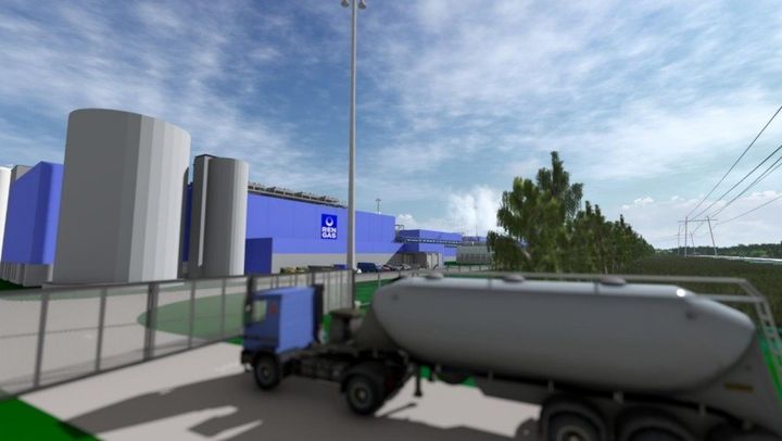 Havainnekuva yhteistuotantolaitoksesta, jossa on sininen rakennus ja säiliöauto etualalla.